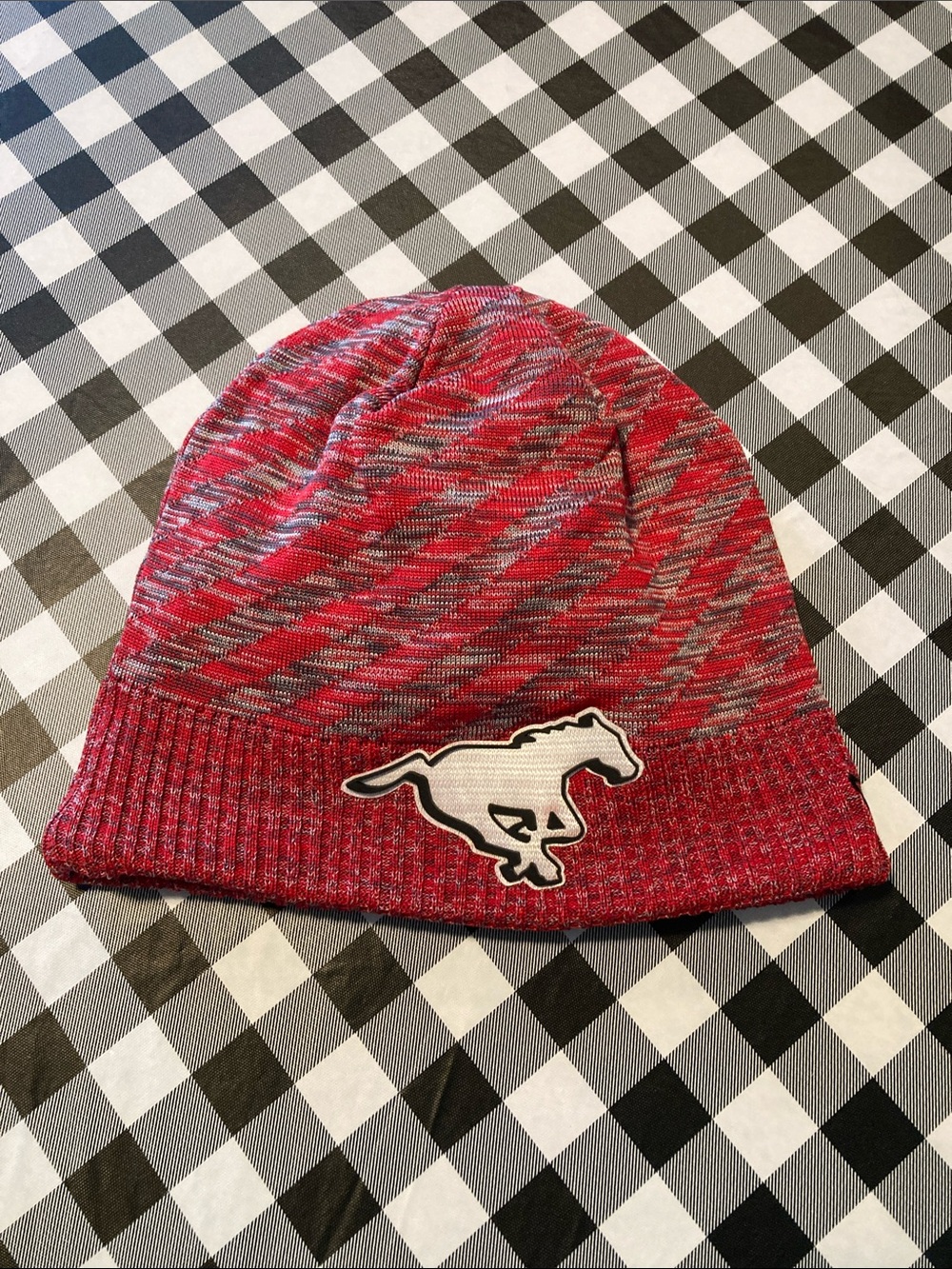 New Era Red Marled Knit Beanie with Calgary Stampeders Logo